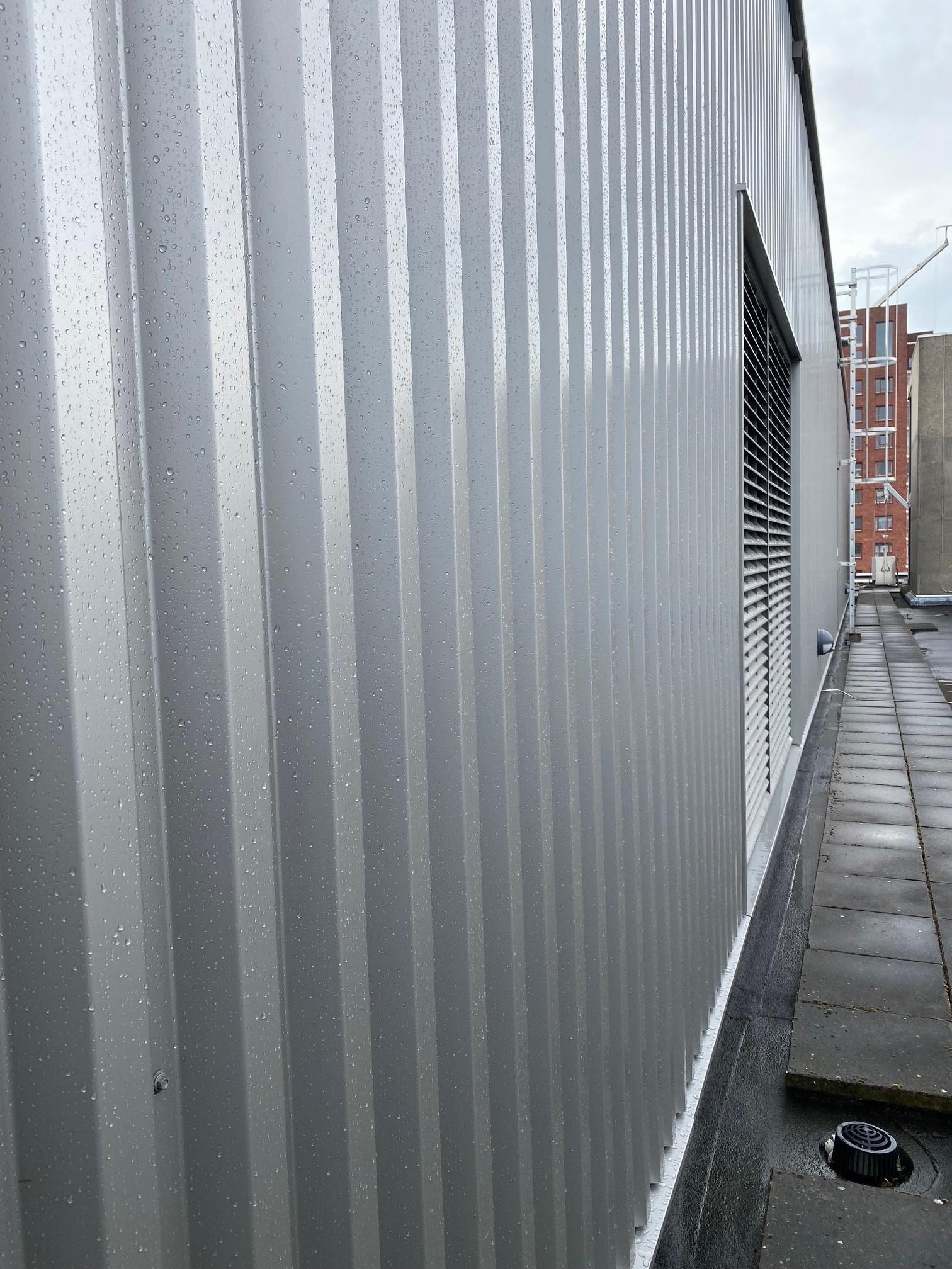 Reiniging van Gevelbeplating door HydroGroep