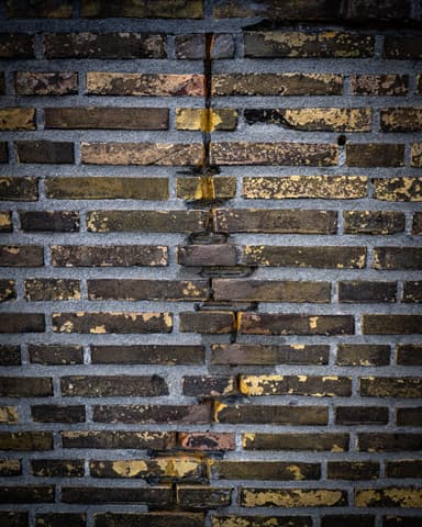 Afgewerkte balkonvloer met nieuwe grijze coating in Rotterdam door Hydro Groep voor Verhoeven Bouwt